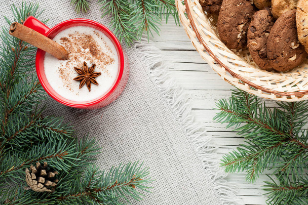 eggnog cocktail in mug arranged with christmas decoration and co - Фото, зображення