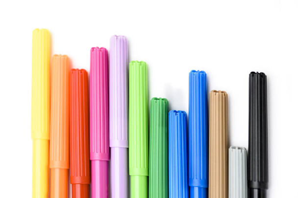 Colorful markers making forms on a white background - Fotografie, Obrázek