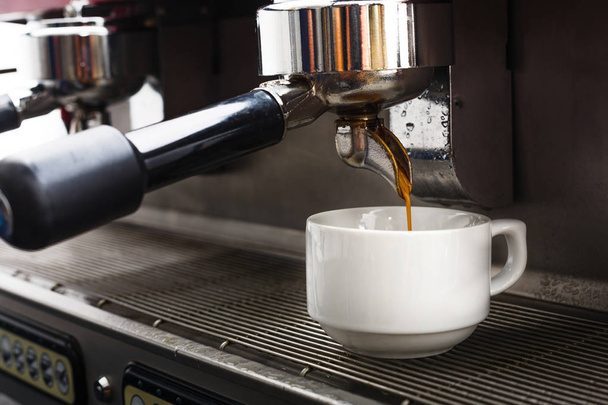 Professional coffee machine making espresso in a cafe - Photo, Image