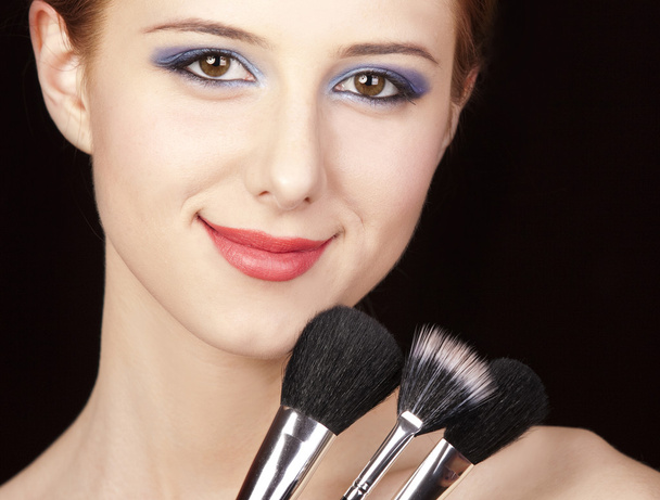 Portrait of beautiful redhead girl with style make-up and brush. - Photo, Image