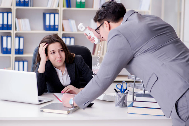 Office conflict between man and woman - 写真・画像