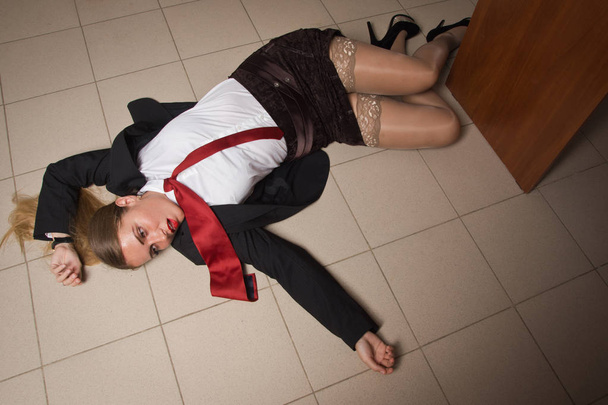 Crime scene with strangled business woman in office - Photo, Image