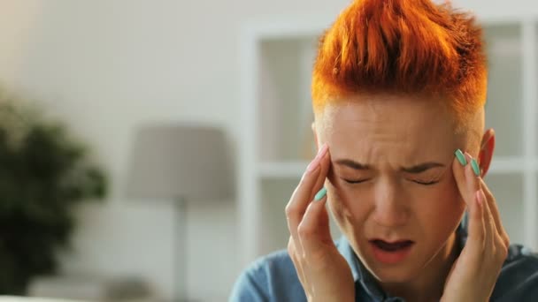 redhead woman with headache - Video, Çekim