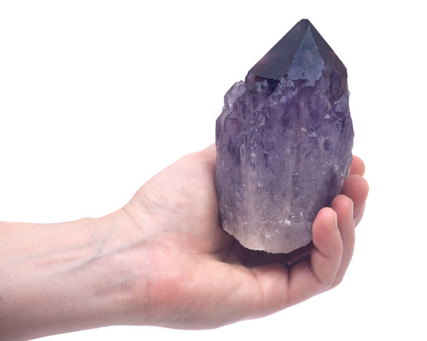 Woman's hand holding Ametrine lightbrary point from Bolivia - Photo, Image