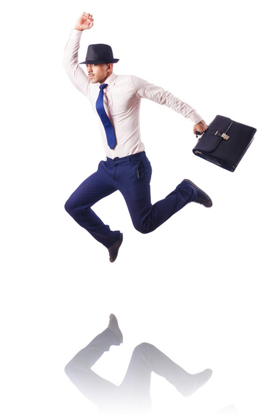 Muscular half naked businessman jumping on white - Photo, Image