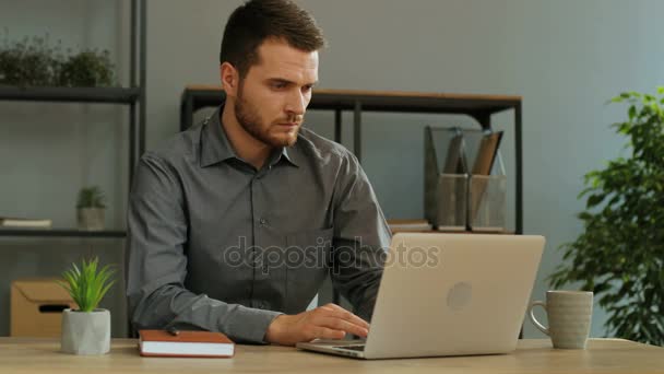 young man using laptop - Felvétel, videó