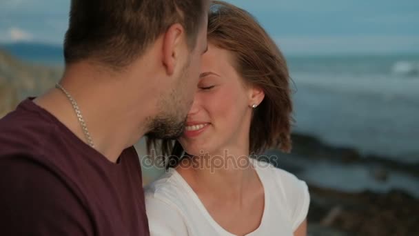 Couple on photo shoot on seaside walking, kissing, enjoy moments - Footage, Video
