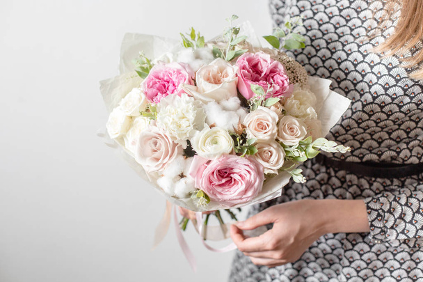 Mix flowers. Luxury bouquets in the girls hands - Fotó, kép