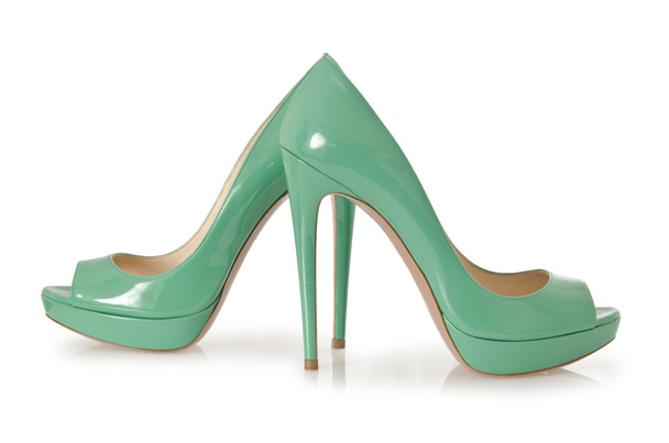 Жіноче зелене взуття ізольоване на білому
 - Фото, зображення