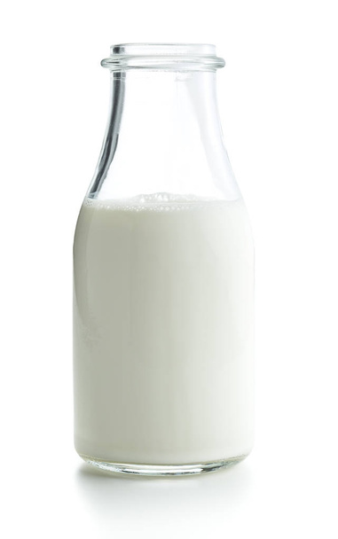 Opened bottle with milk. - Фото, изображение