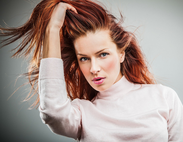 Pretty redhead young woman - Фото, изображение
