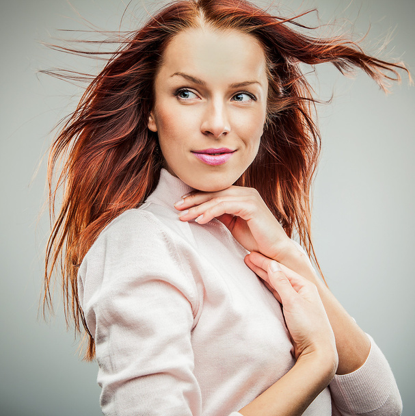 Pretty redhead young woman - Фото, изображение