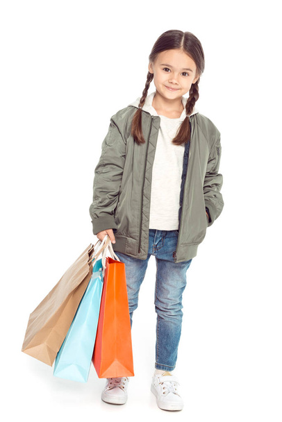 kid with shopping bags - Foto, afbeelding