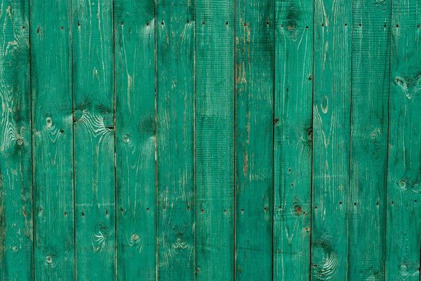 Dark lime vintage wooden boards. Backgrounds and textures fence painted. Front view. Attract a beautiful vintage background. - Фото, зображення