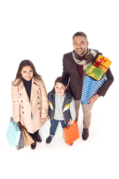 Familie mit Einkaufstaschen mit Geschenken - Foto, Bild