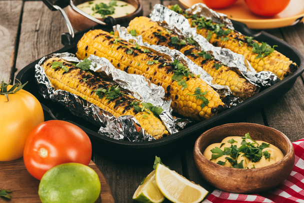 grilled corn covered in foil - Photo, Image
