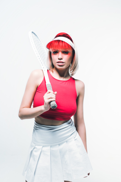 Frau in Sportbekleidung mit Tennisschläger - Foto, Bild