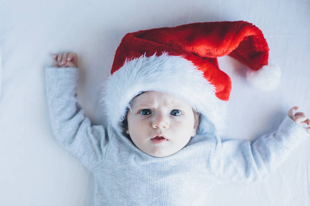 cute baby girl in Santa hat  - Foto, Bild