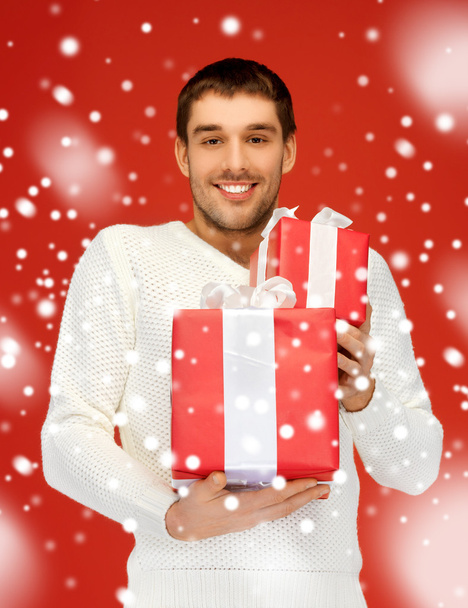 Man holding many gift boxes - Photo, Image