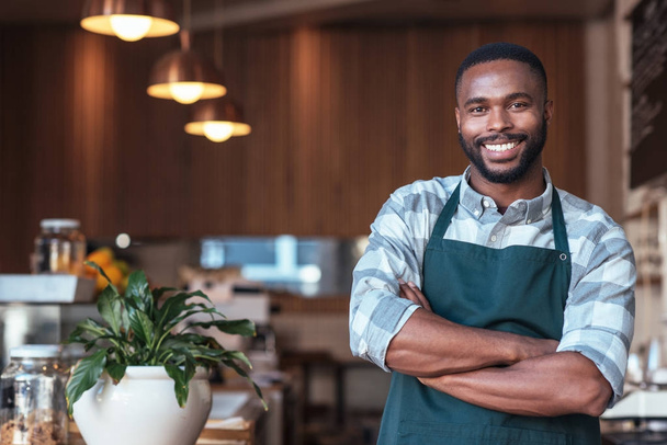 entrepreneur standing in cafe  - Фото, изображение