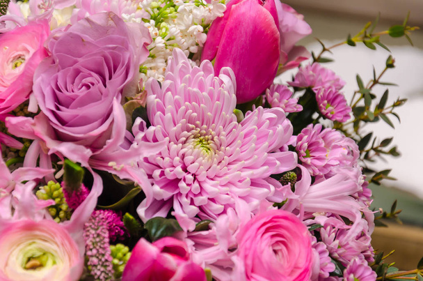 Delicate fresh bouquet of fresh flowers with pink Ranunculus, ro - Photo, Image