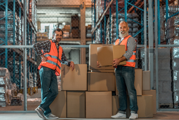 warehouse workers with boxes - Photo, Image