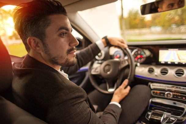 Handsome businessman driving car - Photo, Image