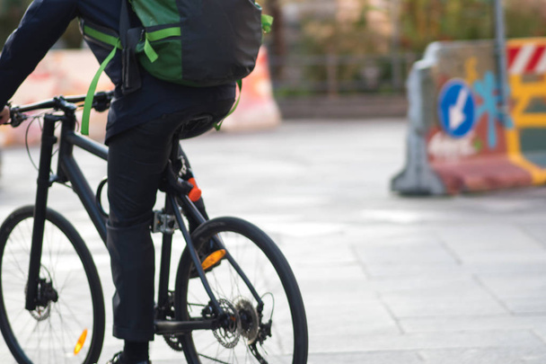 A man on a Bicycle, urban eco-friendly transport - Fotoğraf, Görsel