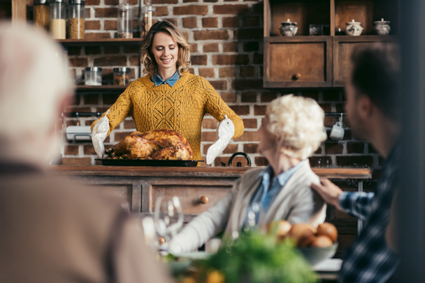 woman with thanksgiving turkey - Photo, Image