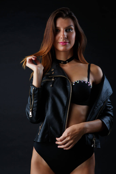 Picture of model in underwear, leather jacket - Foto, imagen