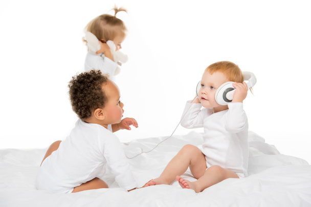 multiethnic toddlers with headphones - Photo, Image
