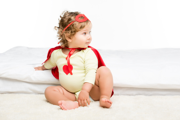toddler in superhero costume - Фото, зображення