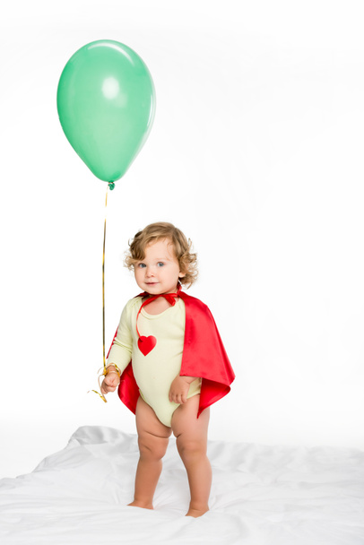 adorable toddler with balloon - Foto, afbeelding