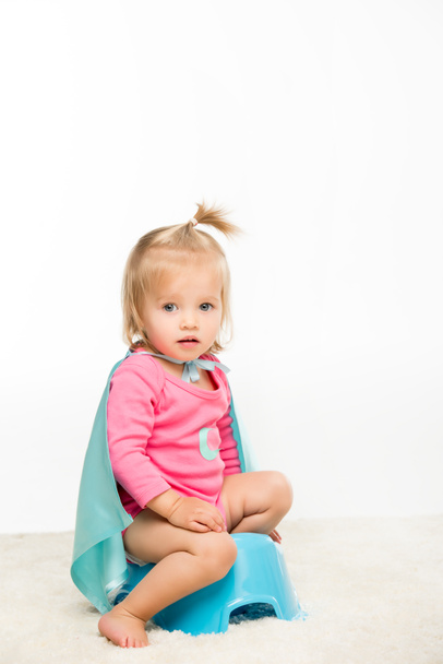 toddler girl sitting on pottie - Fotó, kép
