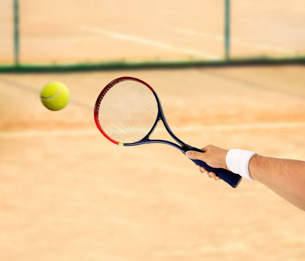 hitting a tennis ball - Fotoğraf, Görsel