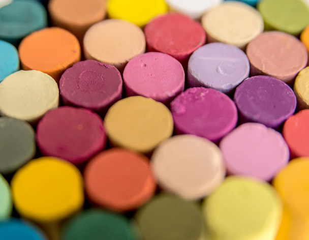 Close up of colorful and bright pastel crayons - Fotó, kép