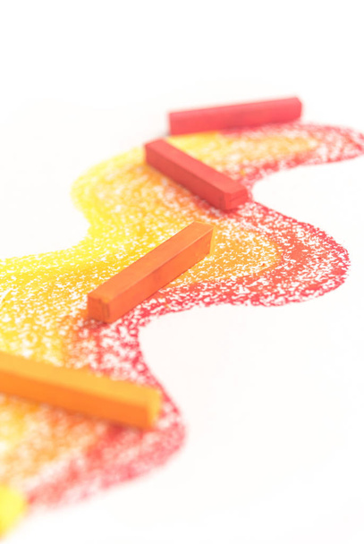 Close up of gradient made of pastel crayon chalks over the color - Photo, image