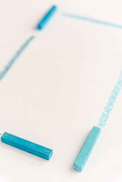 Cropped photo of drawing lines by blue pastel chalks - Foto, Bild