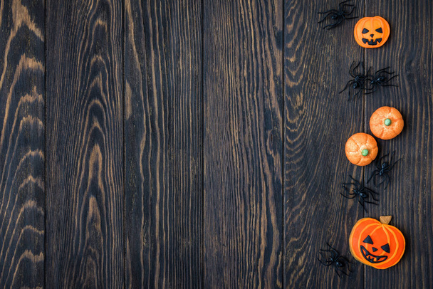 Halloween holiday background with cookies and spiders - Photo, image