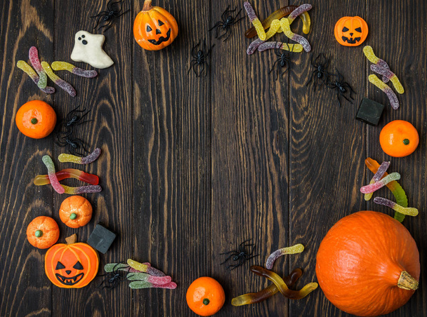 Halloween background with candy and spiders - Foto, Imagem