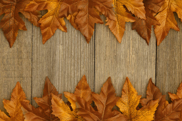 Autumn background with fall leaves on weathered wood - Photo, Image