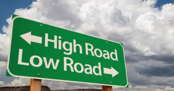 4K Time-lapse High Road, Low Road Green Road Sign and Stormy Cumulus Clouds and Rain. - Footage, Video
