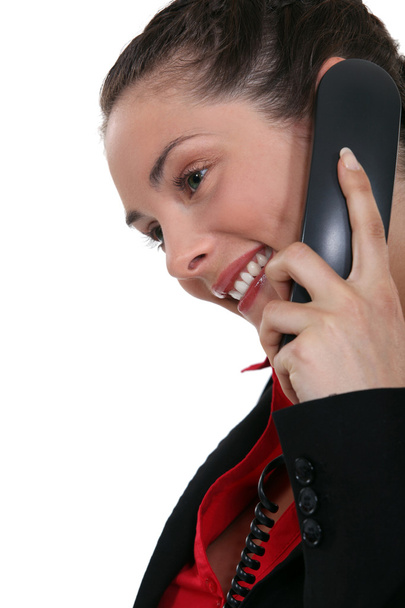A businesswoman over the phone. - Фото, зображення