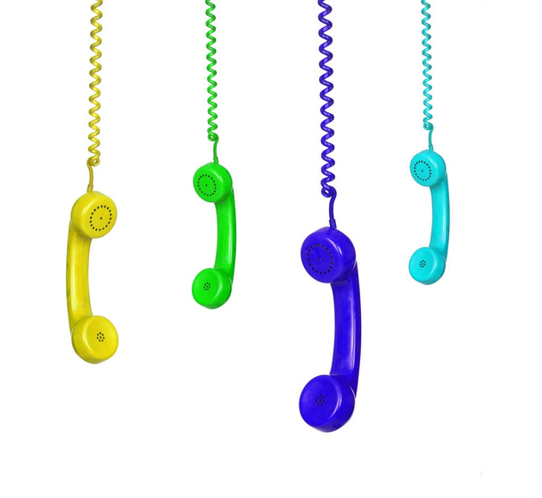 bright vintage telephone handsets hanging isolated on white background - Photo, Image
