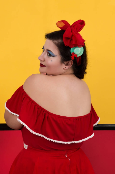 Pinup girl in red and yellow - Foto, Imagem