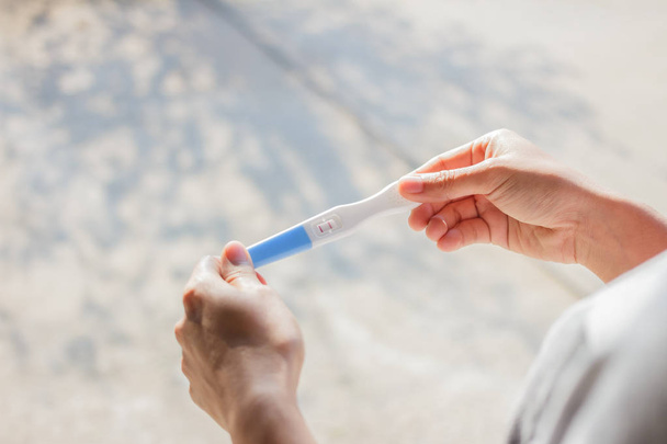 Woman Holding Pregnancy Test - Fotó, kép