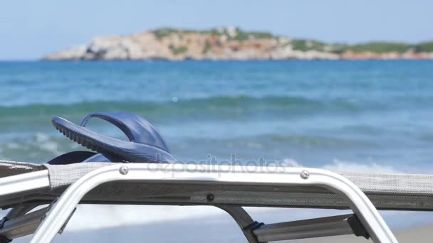 Empty Chaise Longue Under Sun Umbrella on the Ocean Coast - Footage, Video
