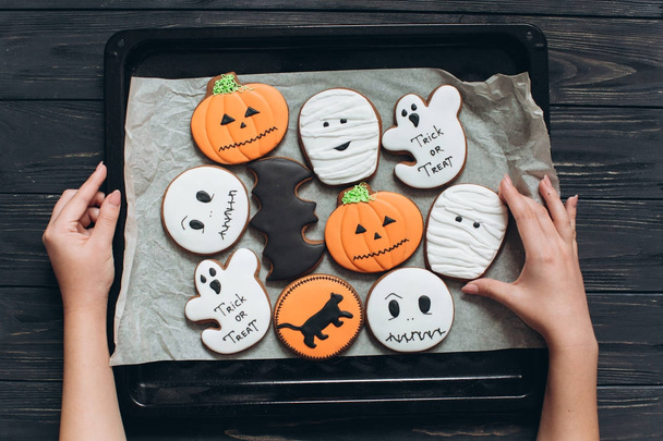 girl cooked gingerbread for Halloween - Photo, Image