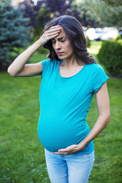 outdoor portrait of pregnant woman - Photo, image