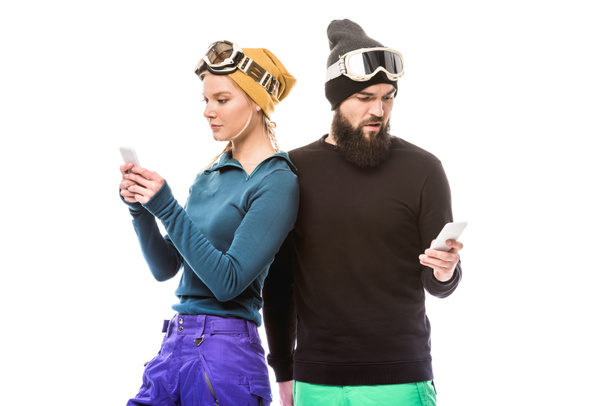 snowboarders usando smartphones
 - Foto, imagen